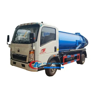 Sinotruk HOWO 5000 litre sewer pump truck in urban service with rear tank cover open and vacuum pump visible