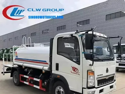 Sinotruk HOWO 5cbm small water truck in light grey with rear working platform and spray nozzles