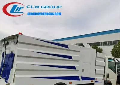 Rear view of the HOWO road sweeper with water spray nozzles and vacuum inlet