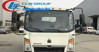 Side view of the 5m3 road sweeper showing stainless steel vacuum tank and water tank compartments