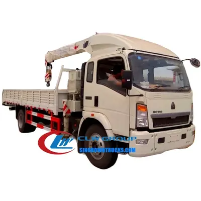 Rear view of the crane lorry with the boom folded and the cargo box secured with tie-down straps