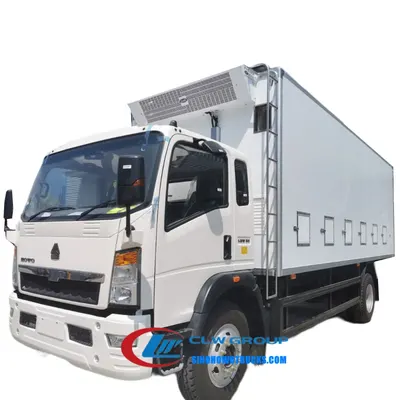 Side view of the HOWO chicks transport truck showing FRP panels and exhaust vents