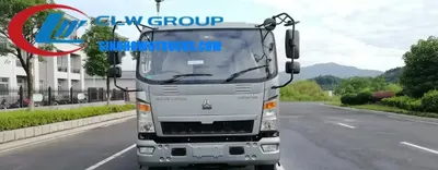 Rear view of the HOWO tipper truck with the hydraulic lift system and open tipper body