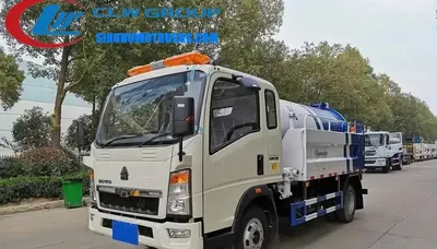 Side view of the HOWO 6 ton sewer jet truck showing the cylindrical vacuum tank and high-pressure pump unit