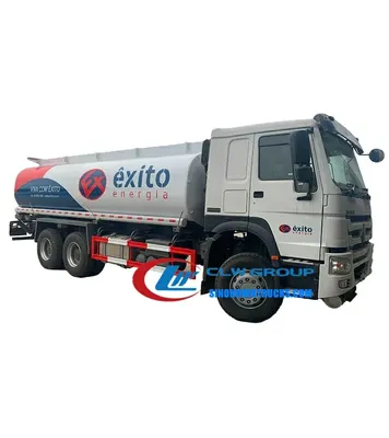 Rear view of the HOWO fuel tanker truck with refueling equipment and fire extinguisher mounts