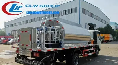 Rear view of the HOWO bitumen distributor showing the computer-controlled spray nozzles and heating system