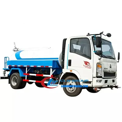 Rear view of the HOWO water lorry with high cannon and rear working platform