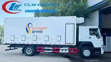 Side view of the HOWO chick transport vehicle showing ventilation and exhaust vents