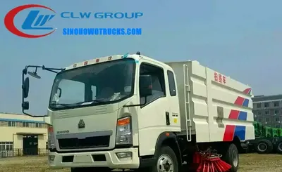 Rear view of the HOWO sweeper with ISUZU auxiliary engine and high pressure air blower