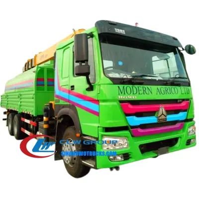 Rear view of the HOWO crane truck with crane boom extended and water tank access door open