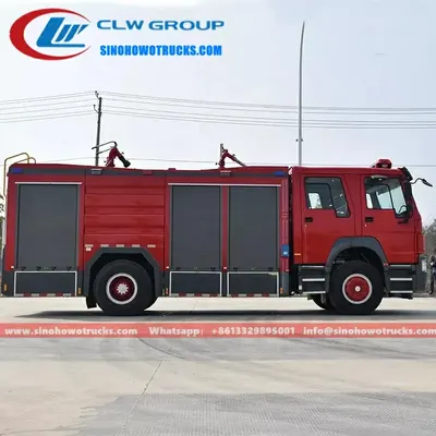 Side view of the HOWO fire truck with open aluminium alloy roller shutter lockers and foam tank access