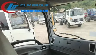 Side view of the HOWO forward dump truck showing the high strength steel body and hydraulic pistons