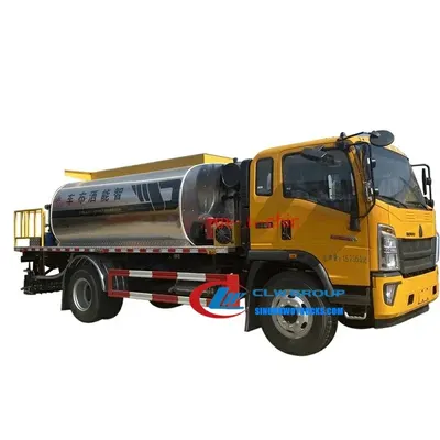 Side view of the HOWO asphalt distributor showing the 8000L tank and adjustable spray width