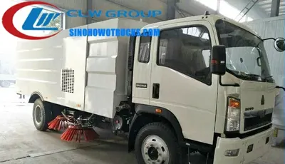 Rear view of the HOWO street sweeper showing the 6m3 stainless steel garbage tank and vacuum inlet