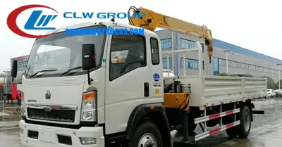 Rear view of the crane truck with the telescopic boom fully extended
