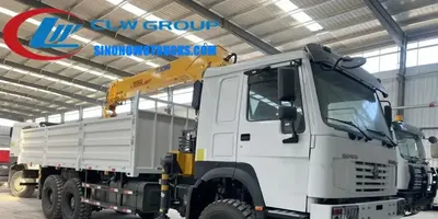 Side view of the HOWO crane truck showing the 360 degree slewing mechanism and boom