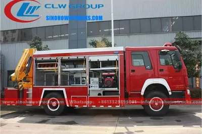 Sinotruk HOWO fire rescue truck with XCMG 5 ton crane in fire service red with lifting lights and fire equipment