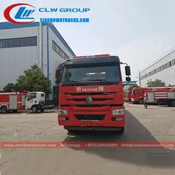 Sinotruk HOWO 8x4 heavy water tender fire truck in fire service red with roof mounted monitor