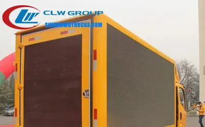 Sinotruk HOWO light duty LED advertising truck with dual side full-color screens in urban setting