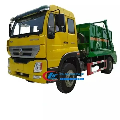 Rear view of the swing arm lifting a sealed skip container from a roadside collection point