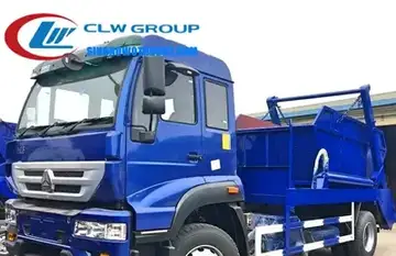 Sinotruk Steyr 10cbm swing arm garbage truck in Cameroon municipal green with detachable skip container