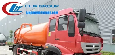 Sinotruk Steyr 12000liters wastewater vacuum truck in standard grey with front-mounted suction pipe and rear-mounted pump
