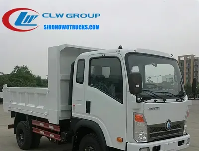 Side view of the 6 ton mining dump truck showing the hydraulic cylinder and reinforced cargo box
