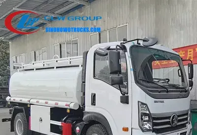 Sinotruk Wangpai 8cbm army fuel truck in military green with right hand drive and 80mm discharge valve visible