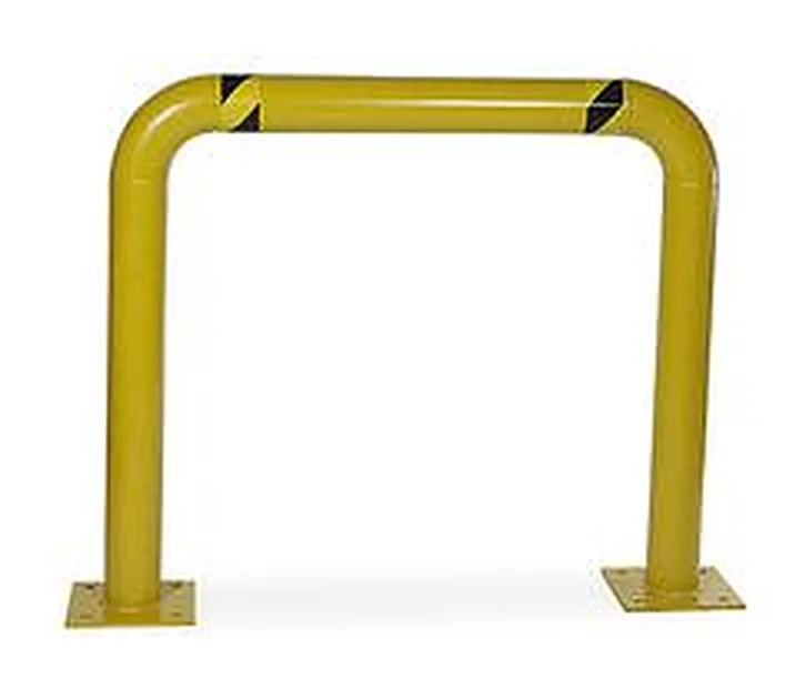 Yellow and black U-frame steel guard rail bolted to a concrete floor