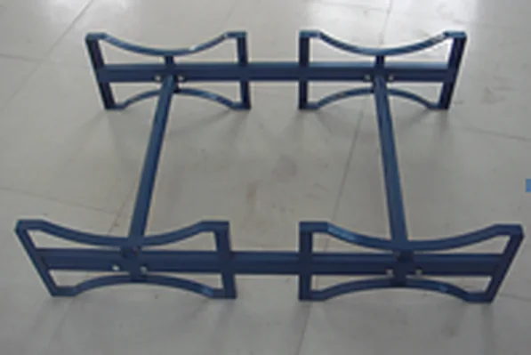 Bare stackable drum rack frame in dark blue on the workshop floor