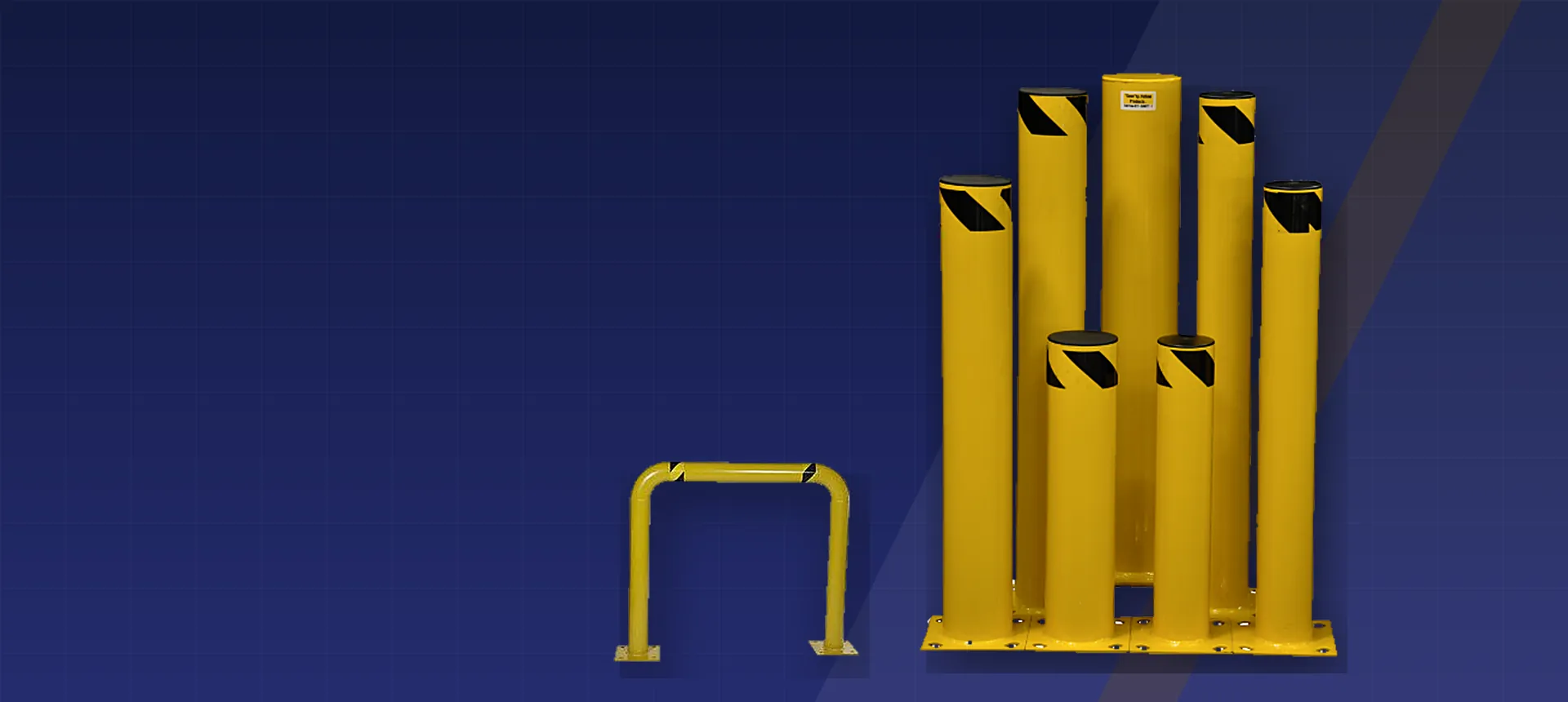 Yellow steel safety bollards and a floor guard rail from the S&L dock equipment range