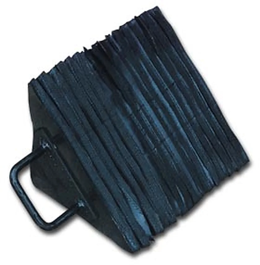 Laminated rubber wheel chock