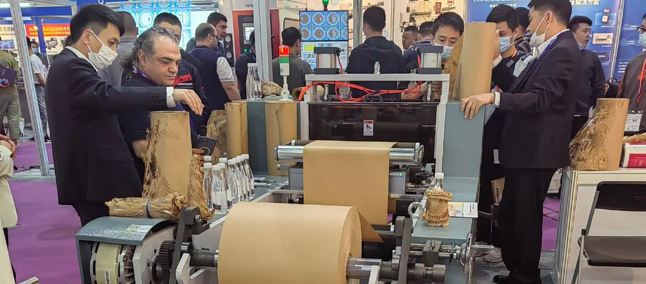 Honeycomb paper making machine running a kraft reel at a packaging exhibition