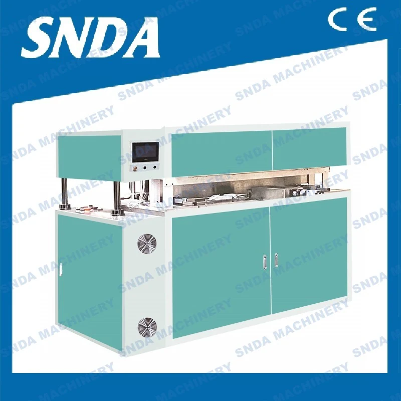 Side view of the SD-PC900 machine with unwinding stand and core forming unit