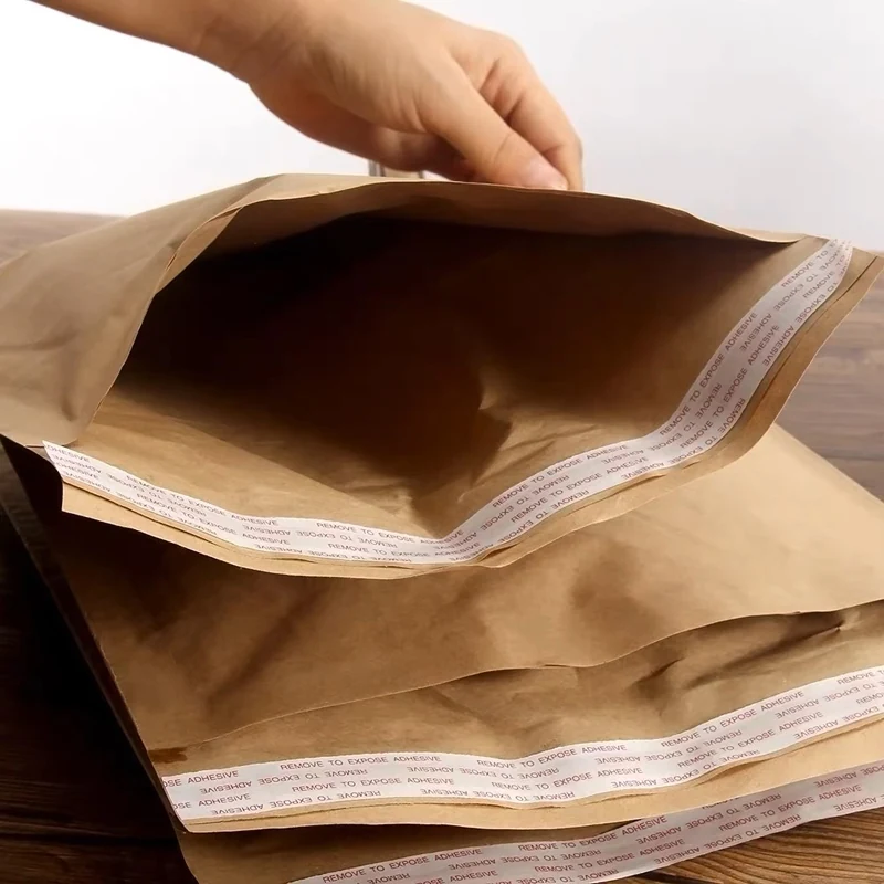 Close-up of the point glue application nozzle bonding honeycomb layer to kraft paper