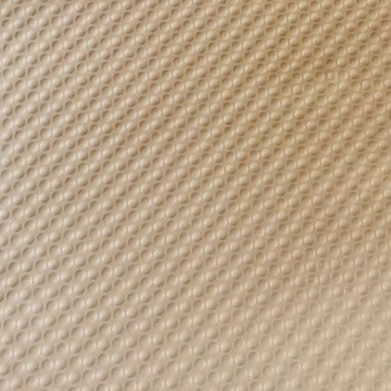Embossed kraft paper showing semi-circular ball pattern and three-dimensional hexagon structure