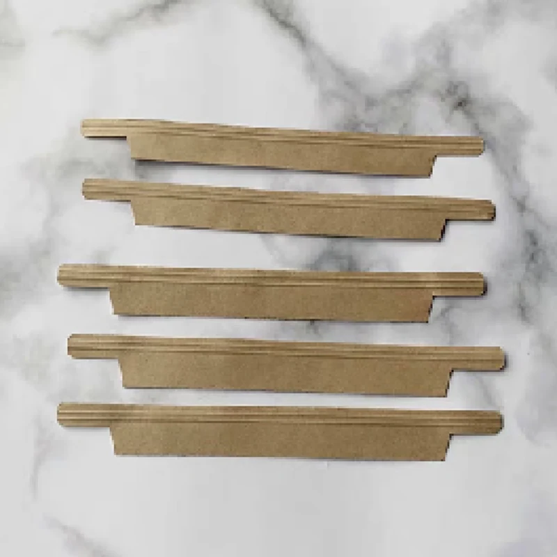 Close-up of the paper and wire coil feeding system on the kraft paper sealing strip machine
