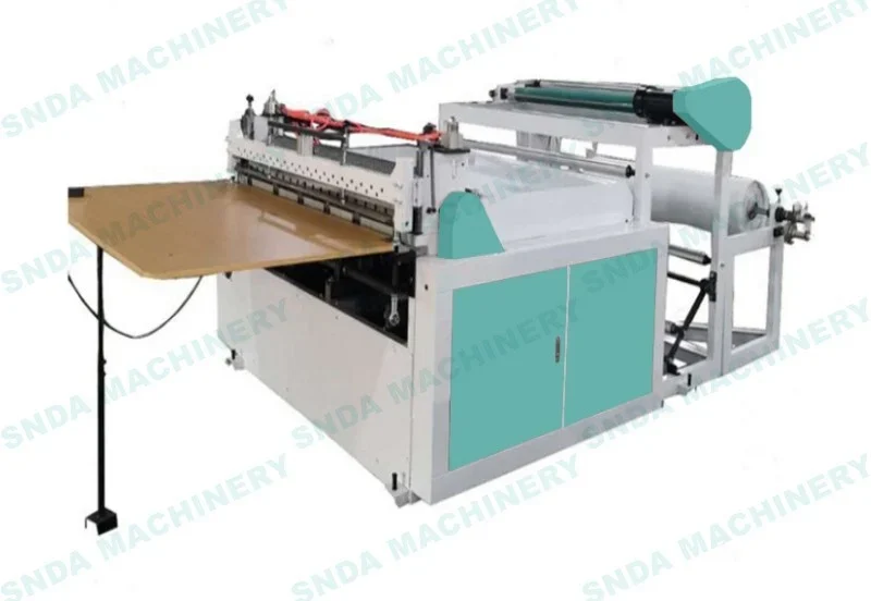 Industrial sheet cutting machine with rollers, teal side panels and cutting table, shown on white background