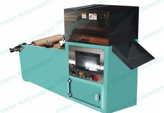 Teal industrial paper cushion packaging machine with touchscreen control panel and operator buttons
