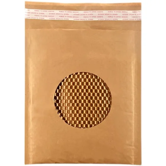 Kraft paper padded mailer envelope with circular cutout revealing honeycomb paper cushioning inside