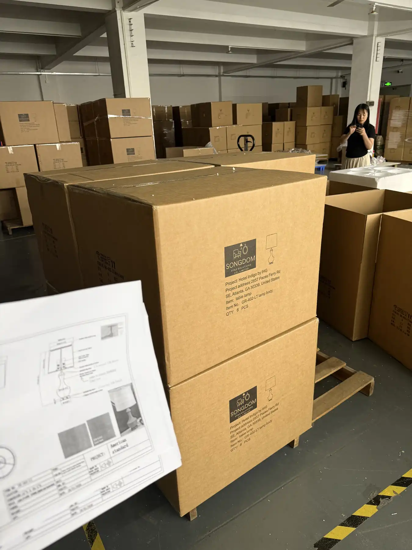 Finished hospitality lamps prepared for pre-shipment inspection