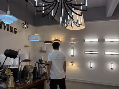 Songdom hospitality lighting showroom with chandeliers table lamps and vanity lights