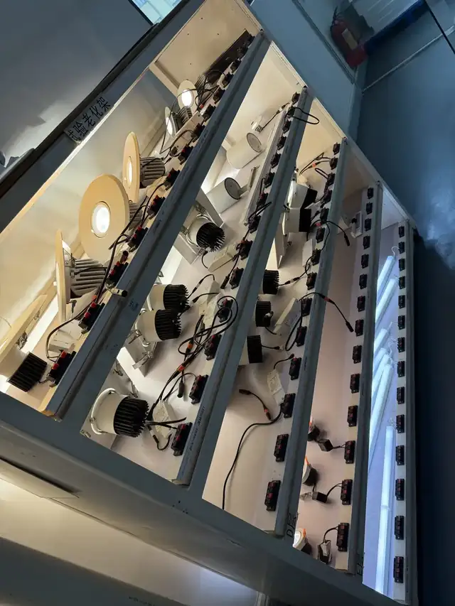 Aging test rack running airport LED lighting fixtures before shipment