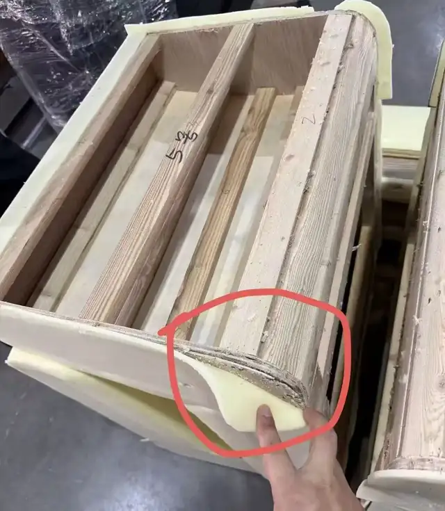Quality control inspection of a hotel furniture component at the factory