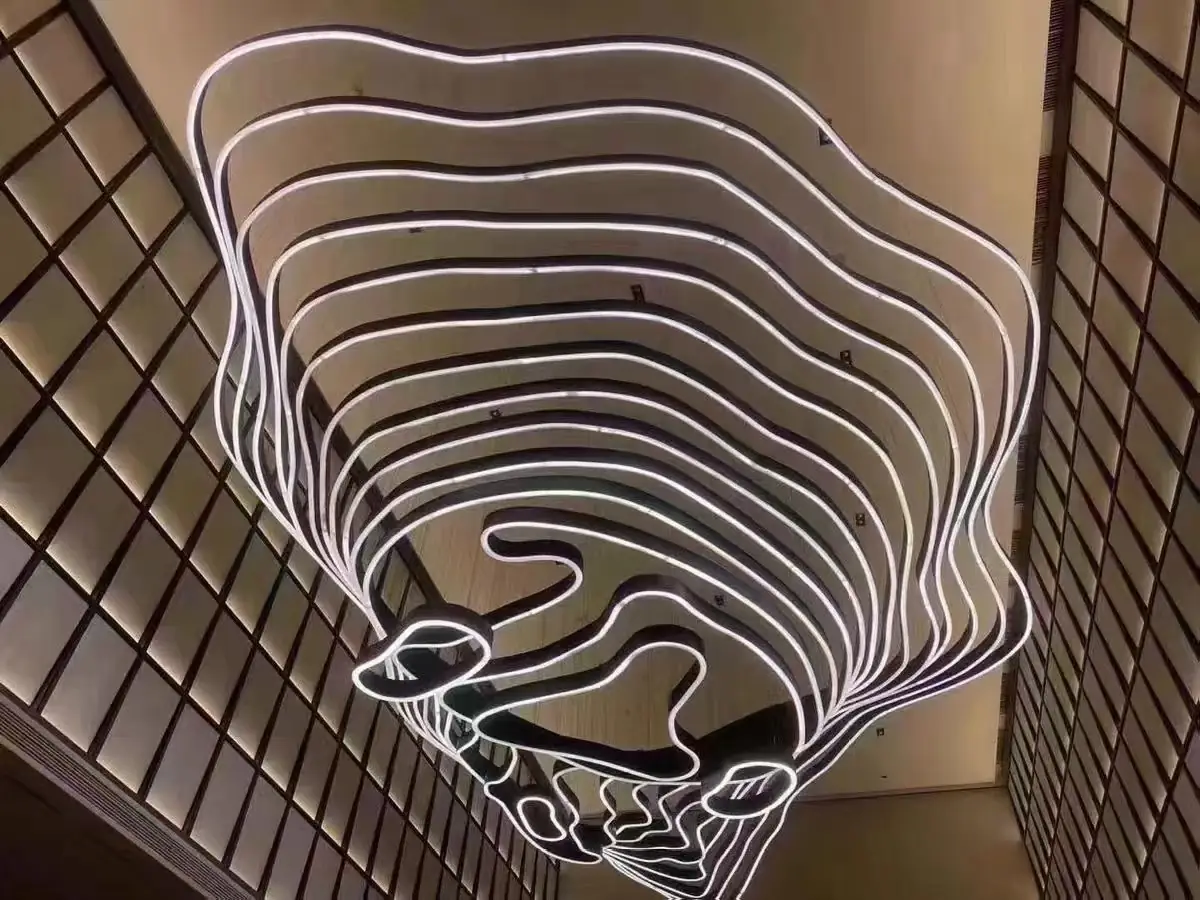 Wave form linear ceiling installation seen from below