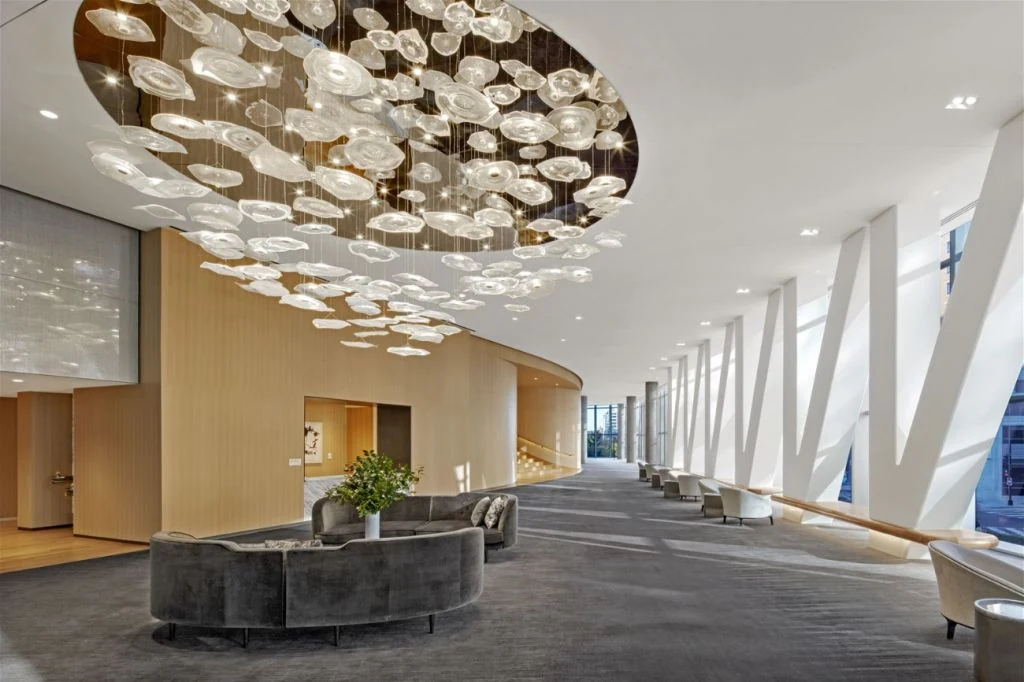 Large ceiling installation of pendant elements in a hotel lobby