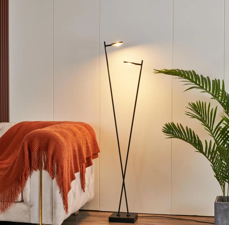SL2312-2C floor light lit beside a sofa