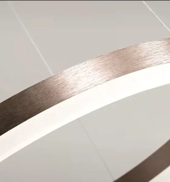 Close detail of a finished brushed aluminium lighting ring