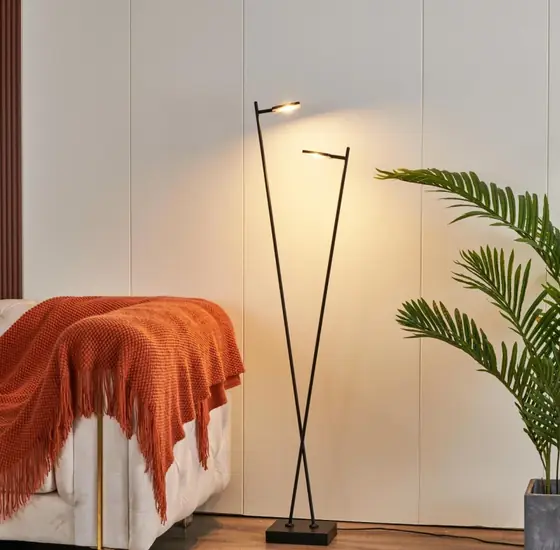 SL2312-2C floor light lit beside a sofa