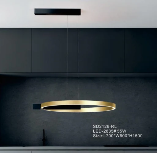 SD2126 up and down pendant light in rose gold lit above a dark interior